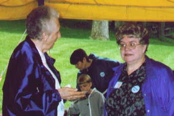 Patty talking under tent