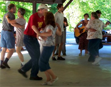 Taylor Runner leading a square dance