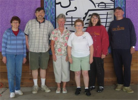 smiling group of volunters and organizers