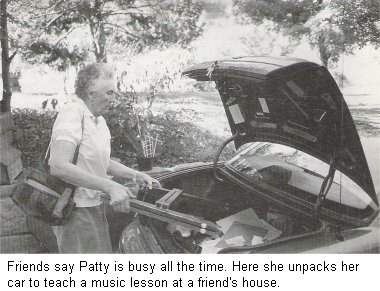 Friends say Patty is busy all the time. Here he unpacks her car to teach a music lesson at a friend's house.