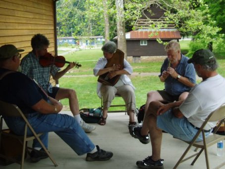 playing fiddle, autoharp and flute